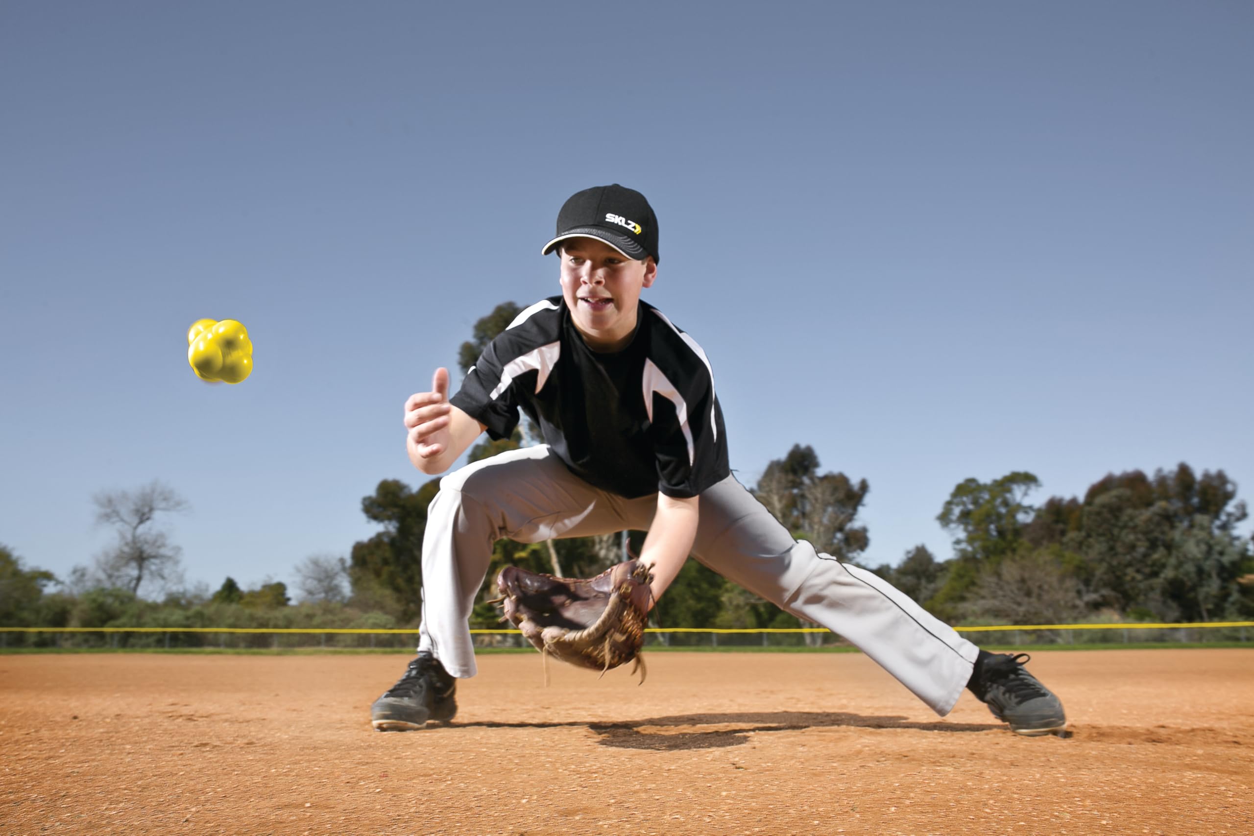 sklz-sv6-balle-de-r-action-6-faces-en-caoutchouc-rebonds-al-atoires-jaune image 3